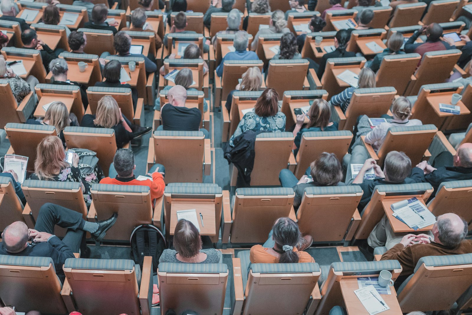 An audience seated in a lecture theatre