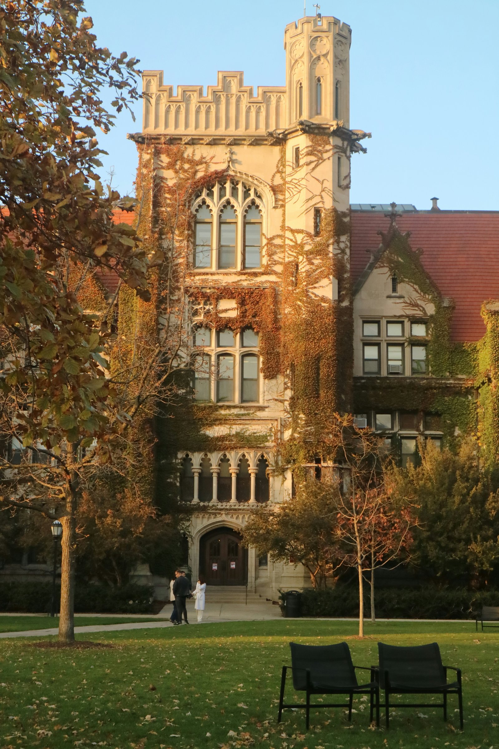 An ivy-covered college tower in autumn